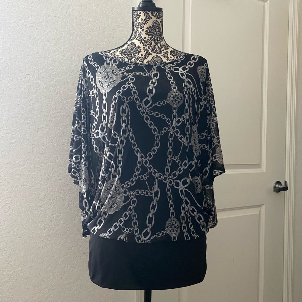 Jennifer Lopez Black and White Boxy Blouse